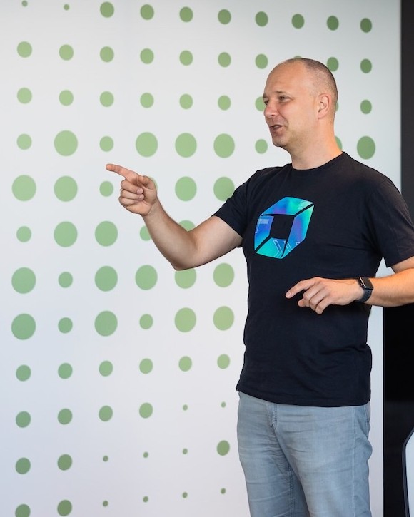 Milan talking with a room at Dynatrace, pointing to someone in the audience